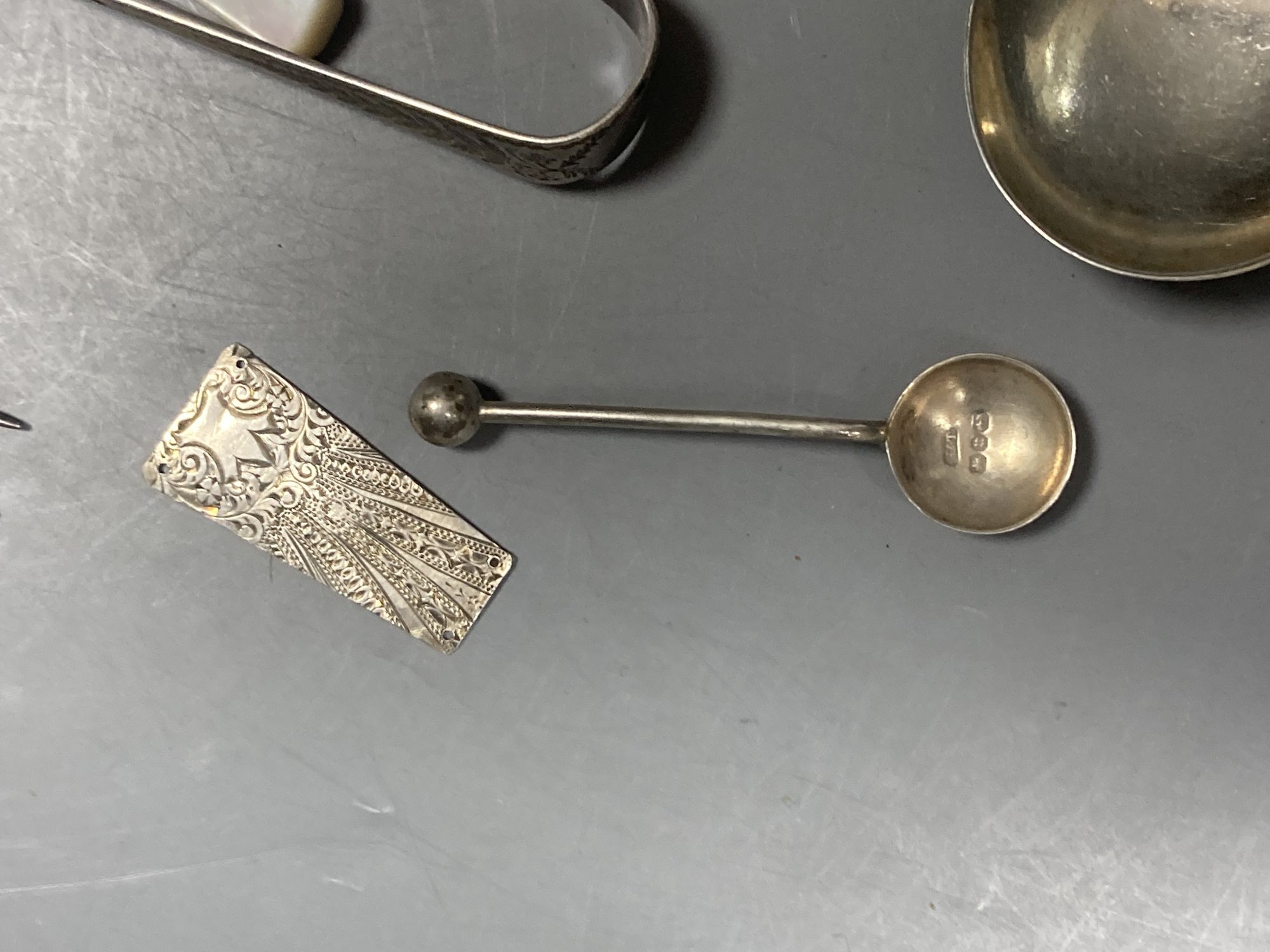 A group of assorted Chinese white metal spoons and forks, including set of six teaspoons and ten small items of English silver.